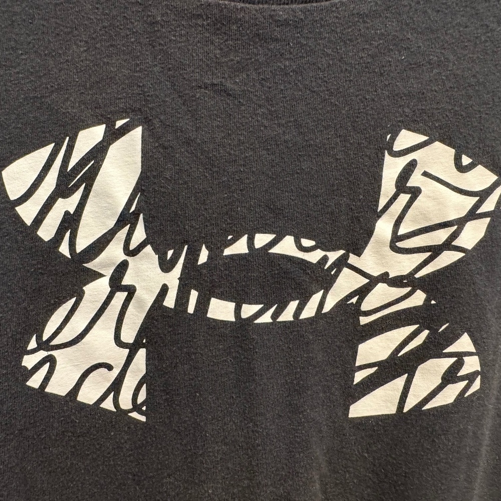 Under Armour xs womans  black t-shirt material with white and black logo